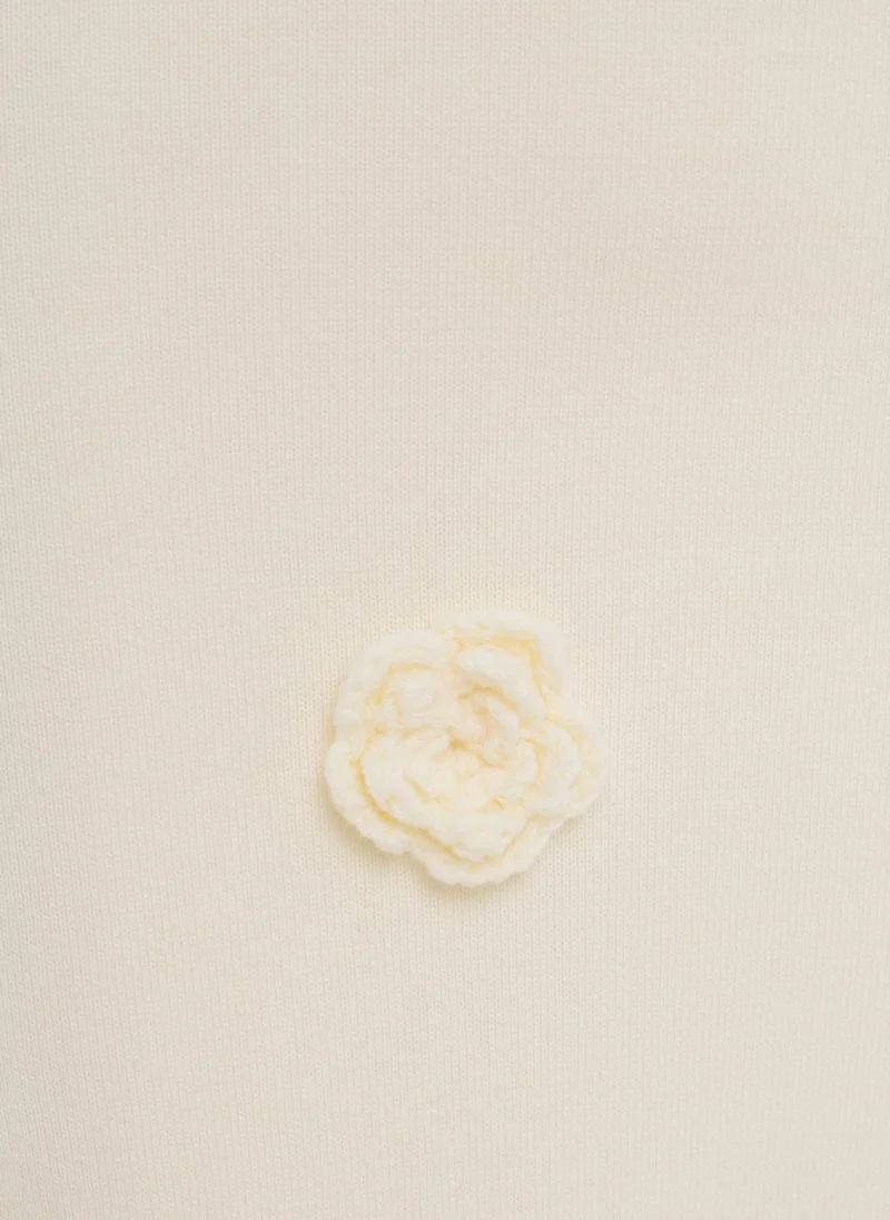 Lichi Jersey maxi dress with knitted flowers on the skirt